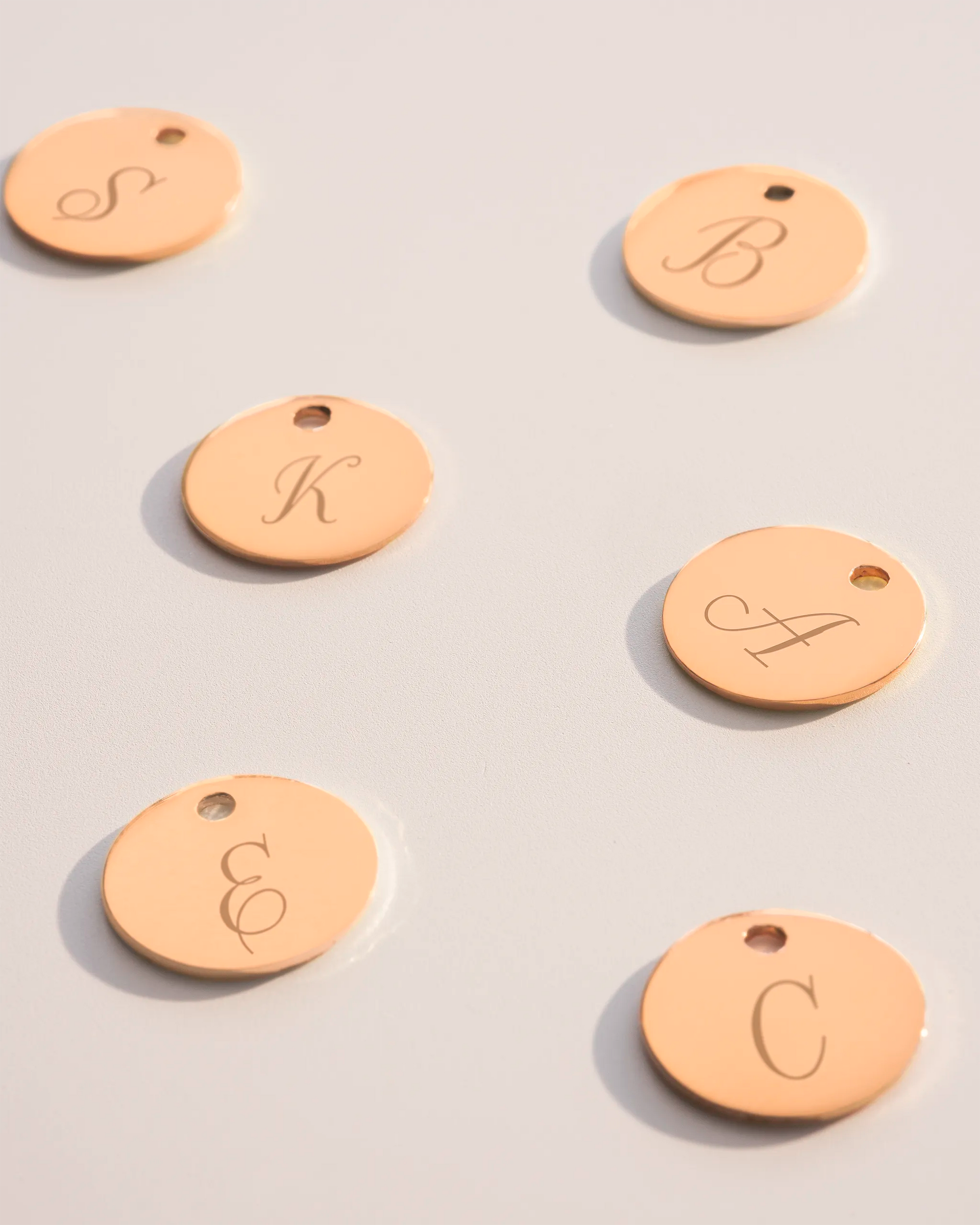 Rose Gold disc charms with initial engravings
