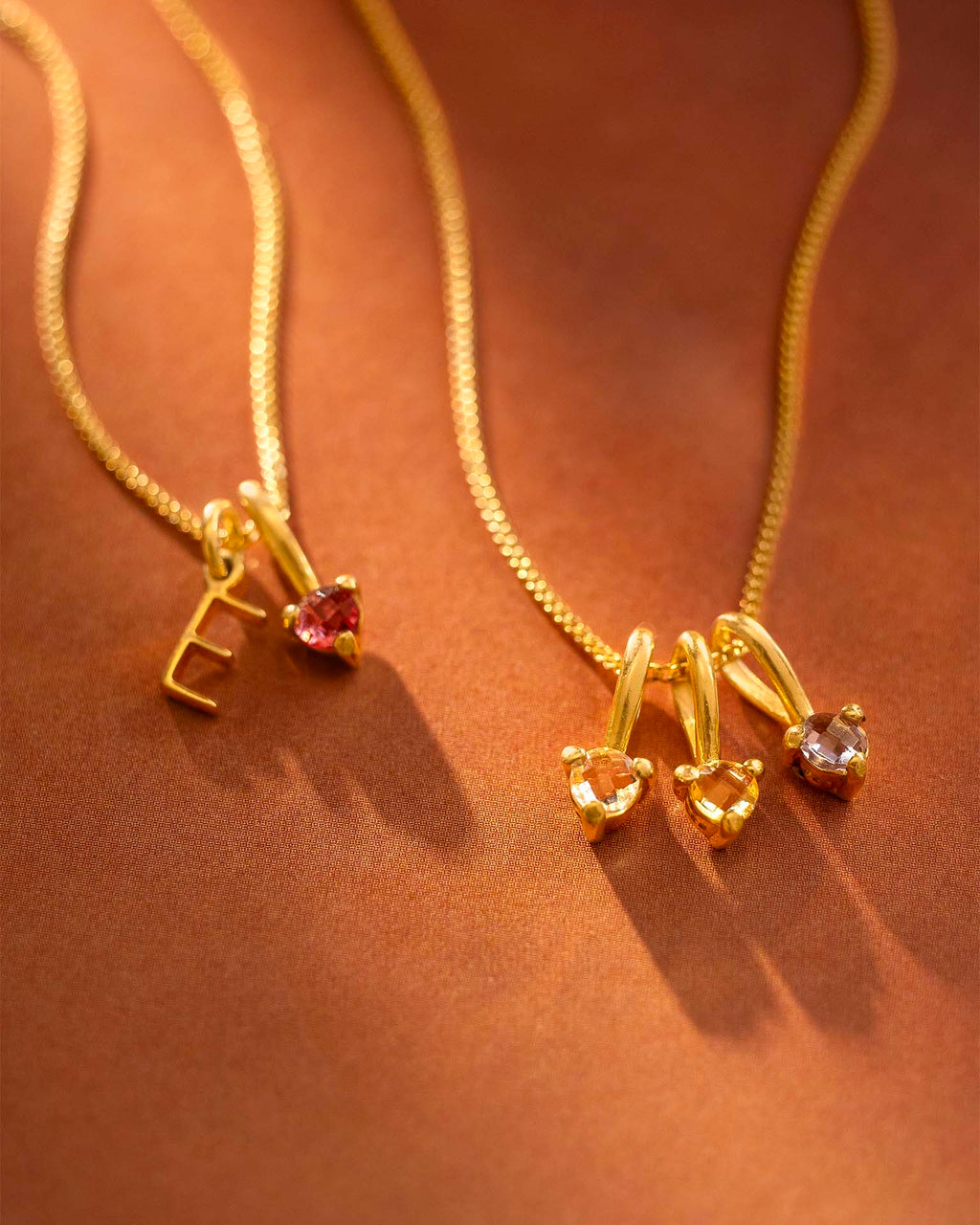 Necklaces on terracotta background |Christmas