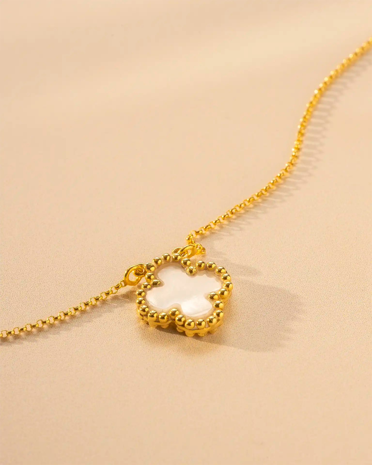 Gold pearl clover bracelet