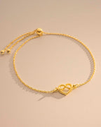 Gold Heart Knot Charm Slider Bracelet