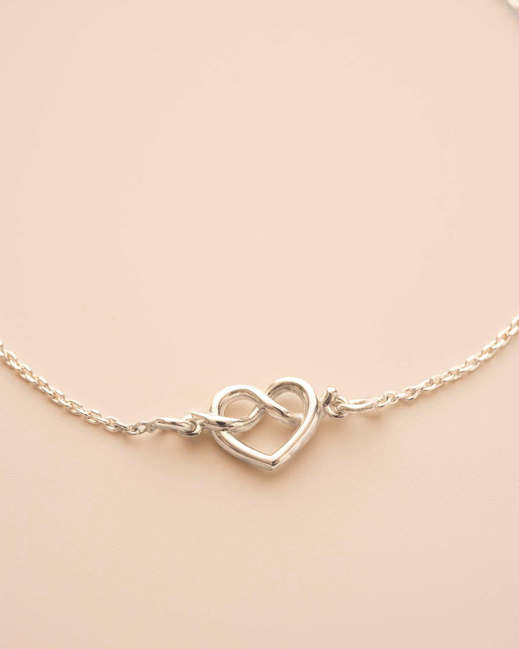 Silver Heart Knot Charm Slider Bracelet