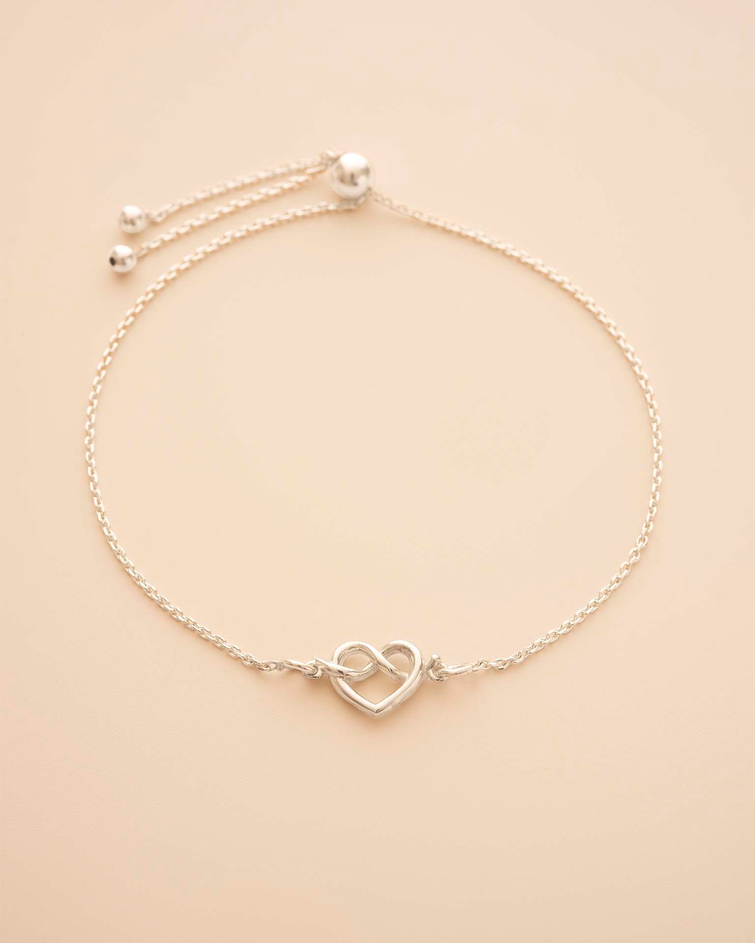 Silver Heart Knot Charm Slider Bracelet