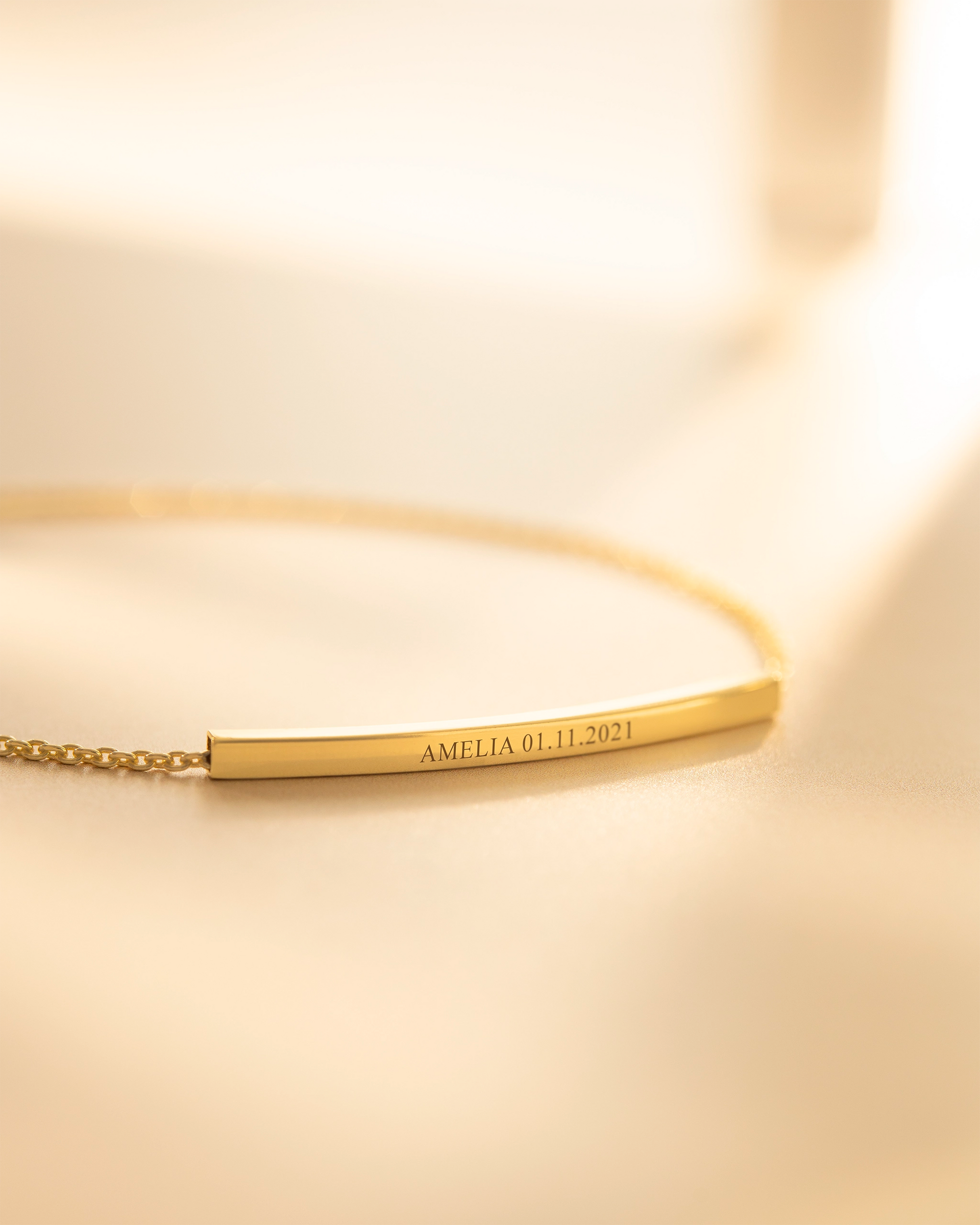 Gold bar bracelet with engraving