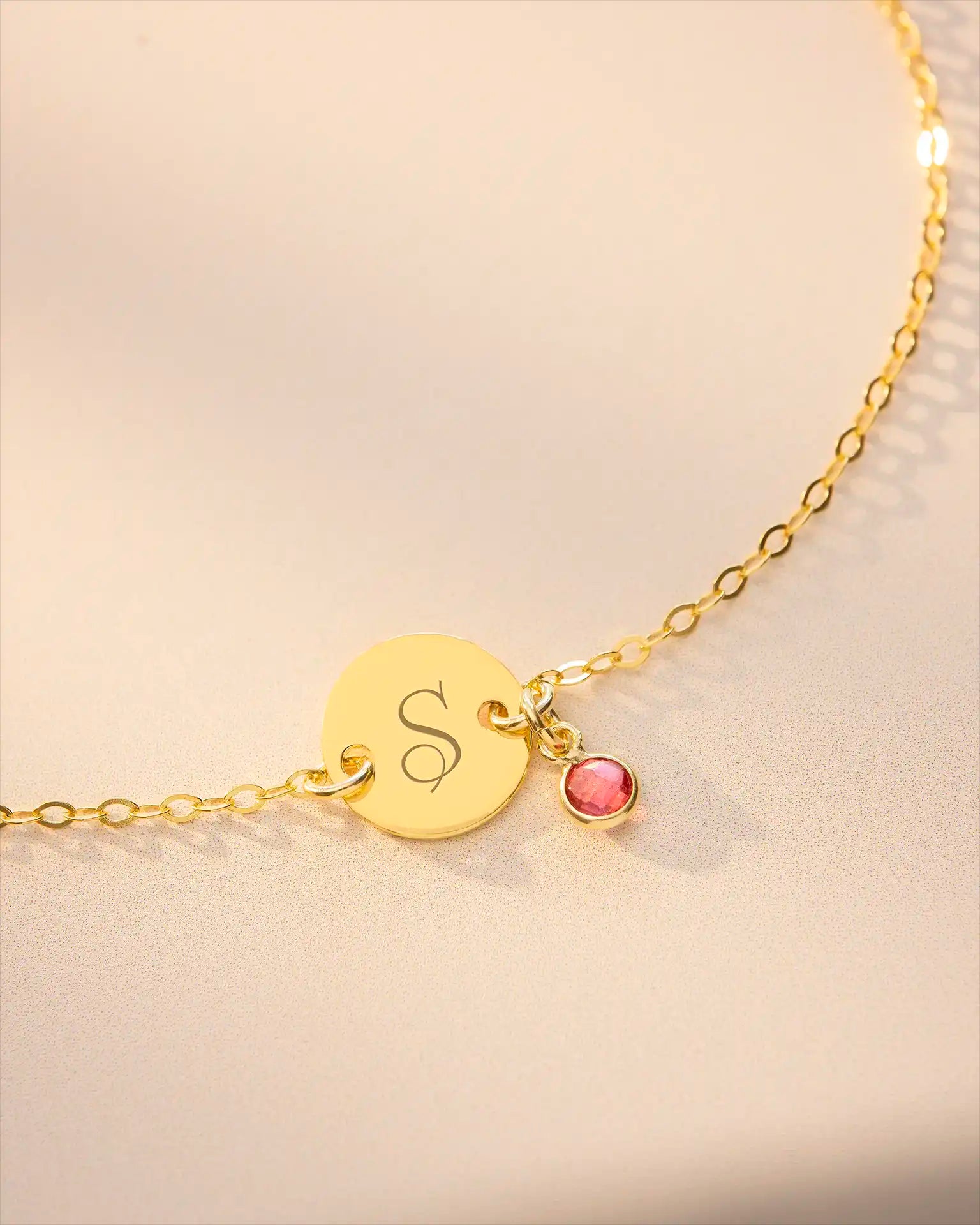 Gold initial disc and birthstone bracelet