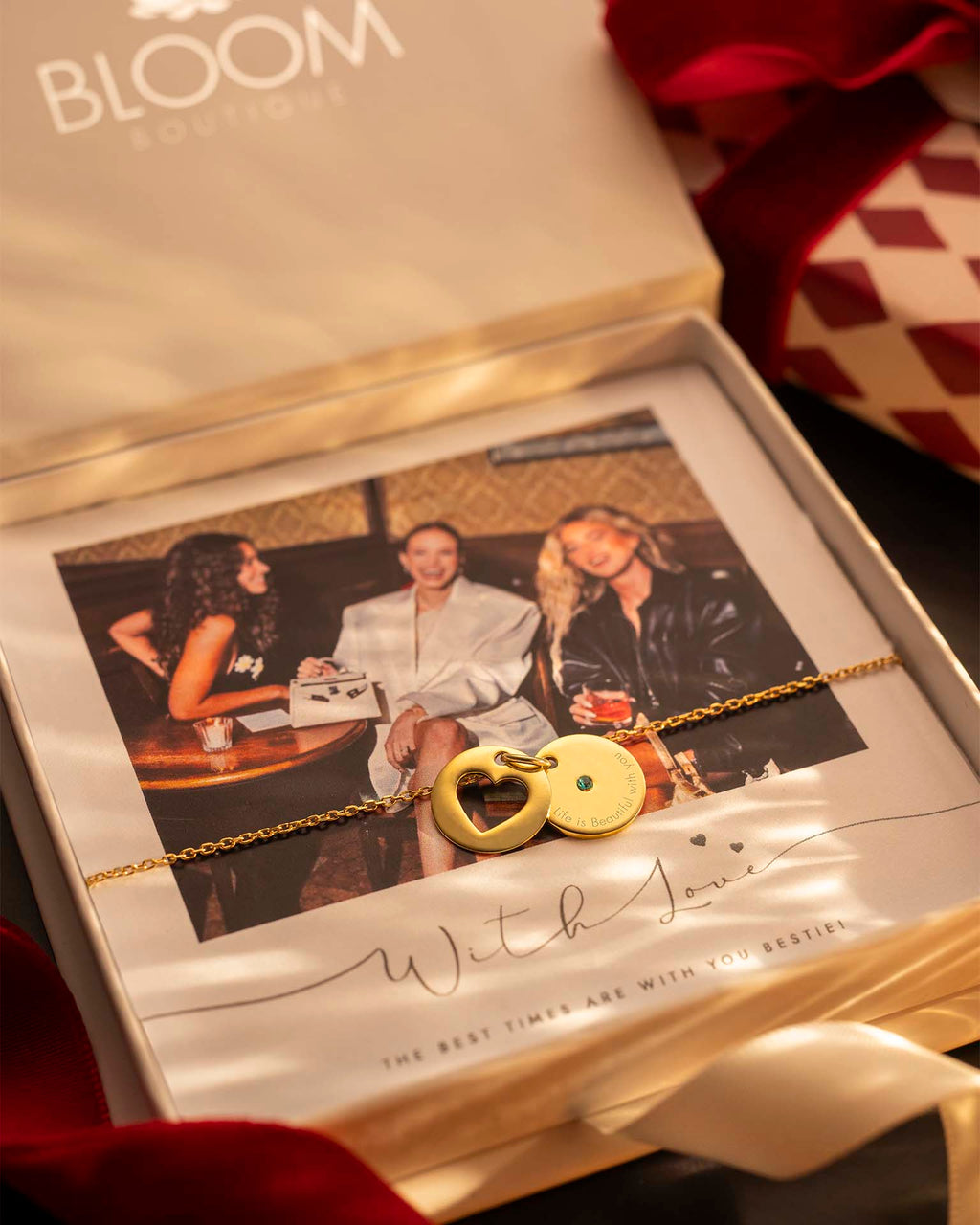 Gold necklace with a lock pendant in a Bloom box