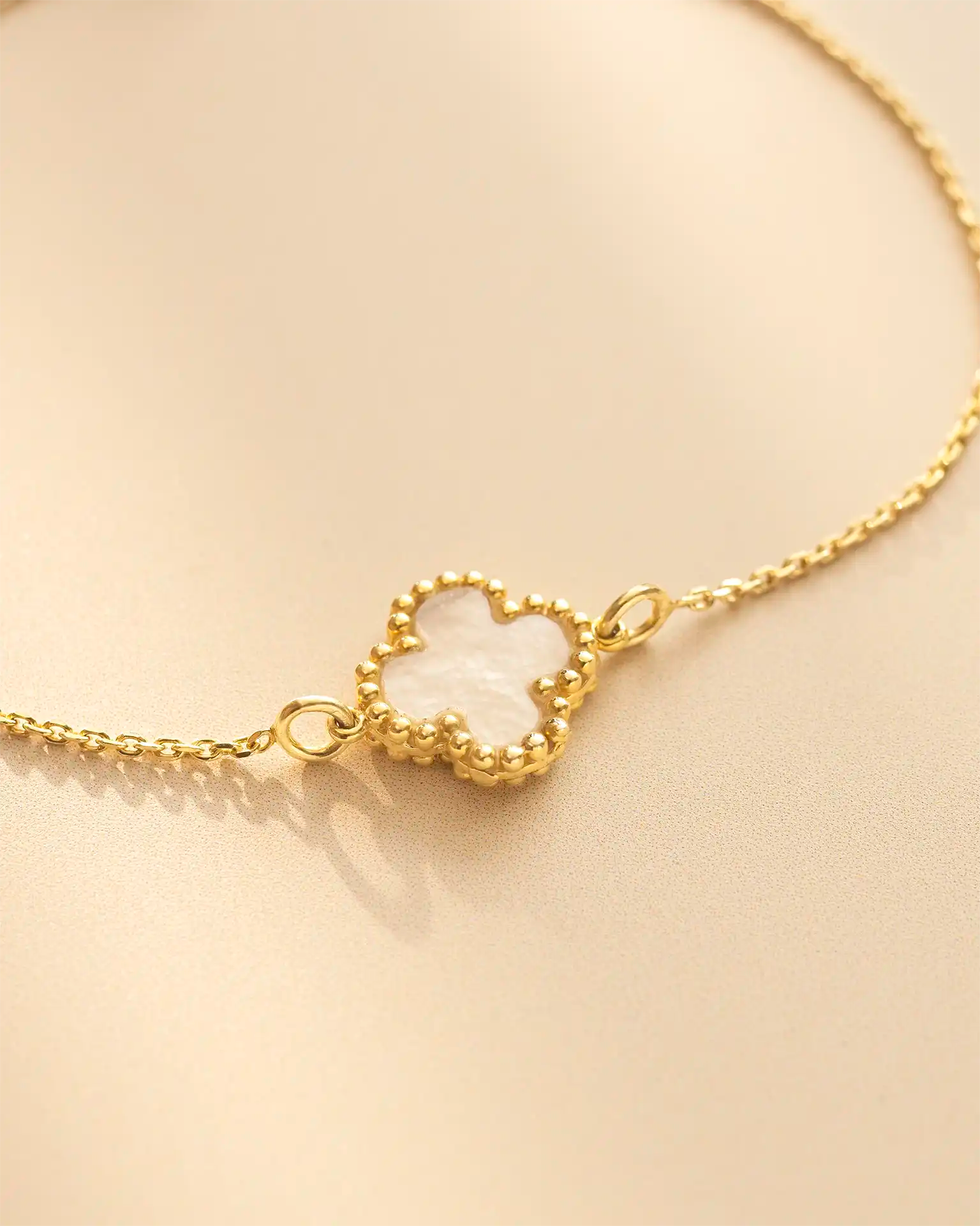 Gold pearl clover bracelet