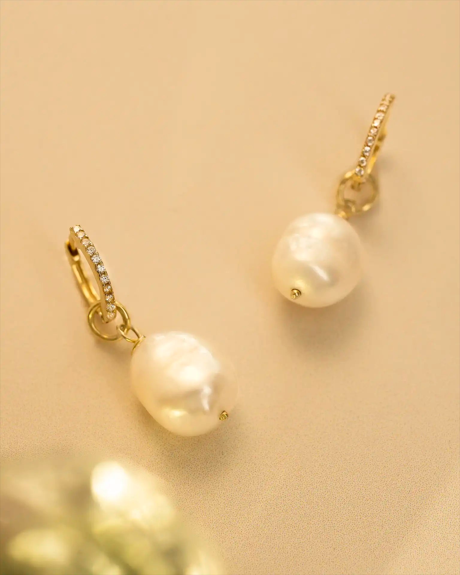 Gold pearl earrings