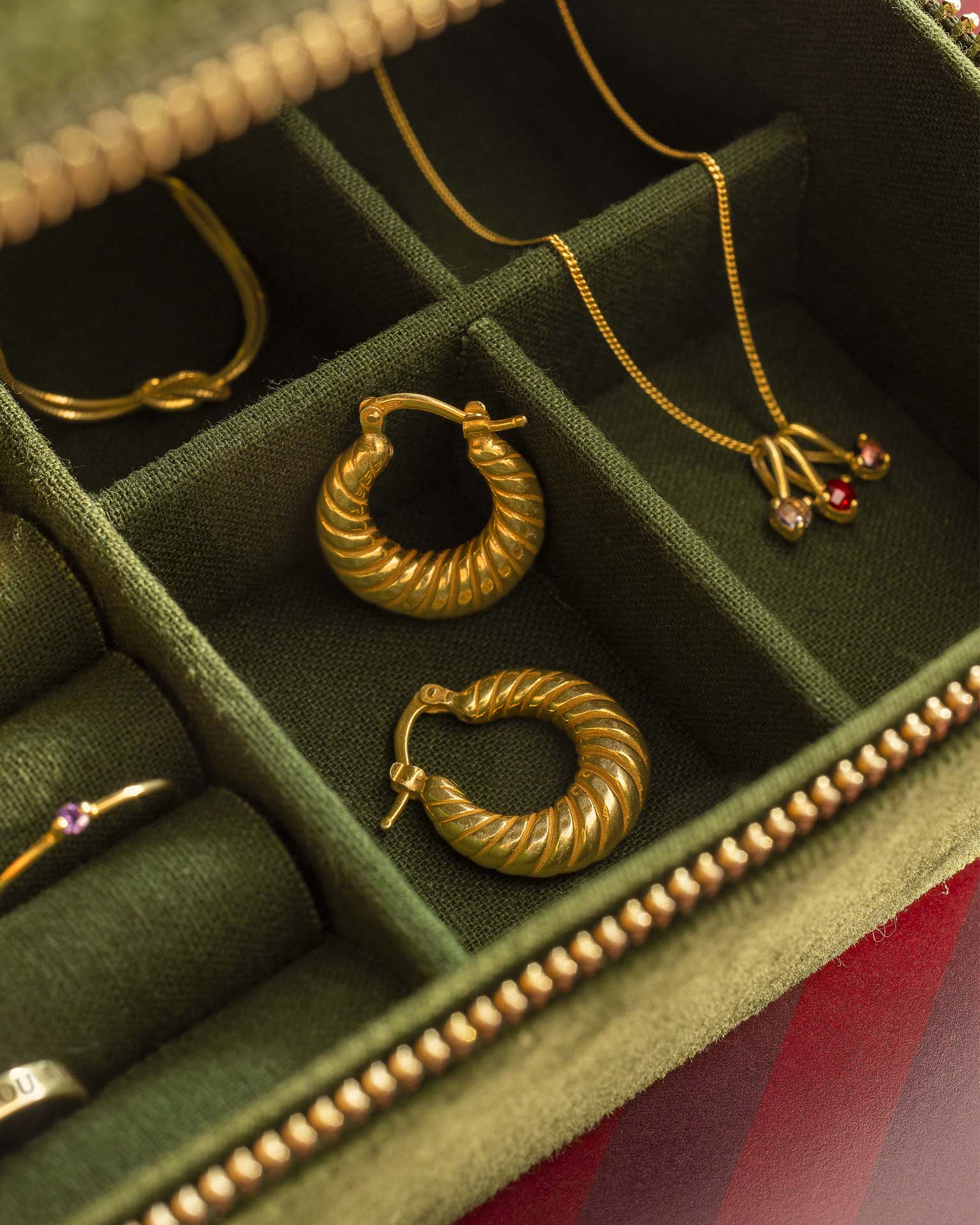 Gold earrings in jewellery box | Christmas