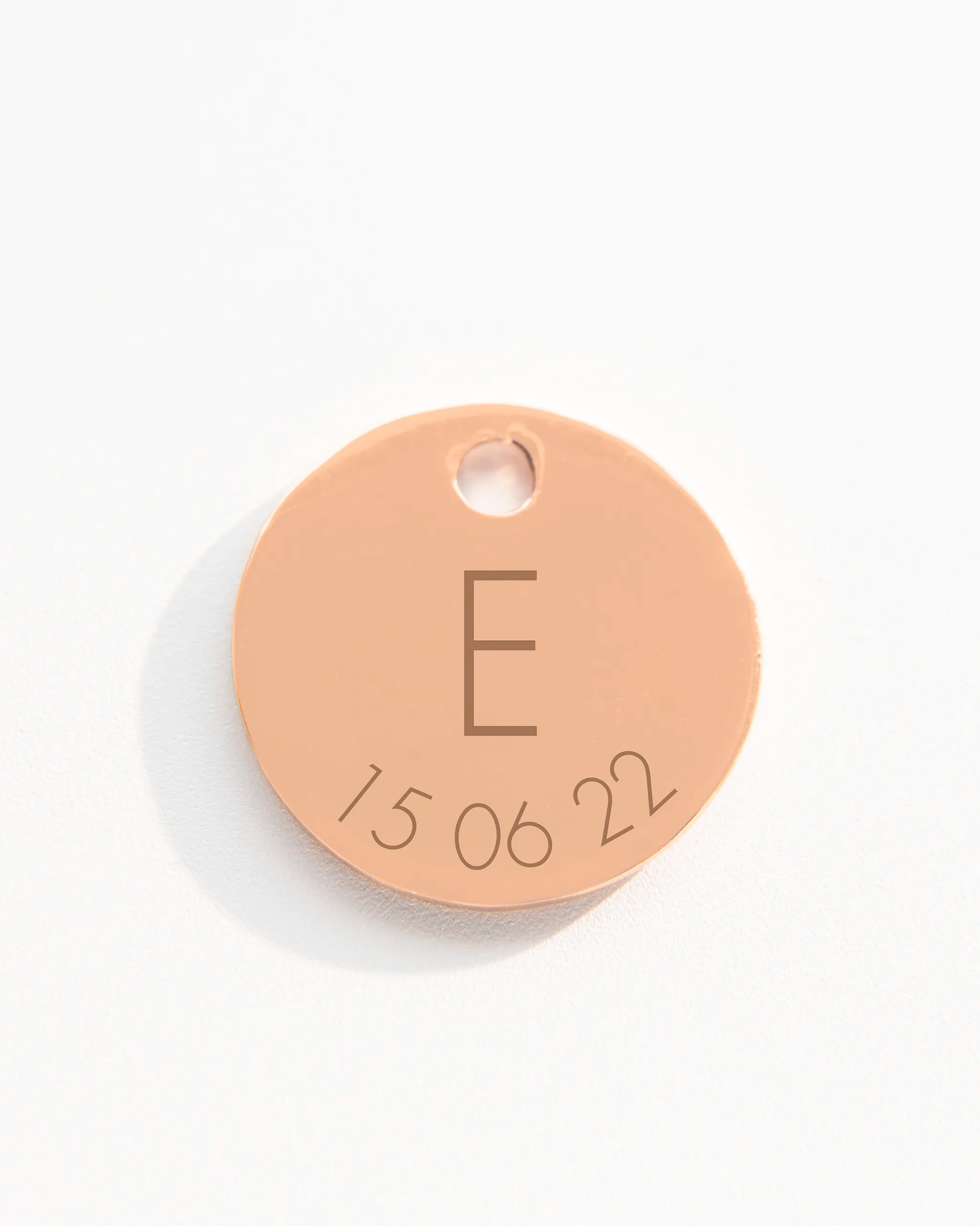 Rose gold disc charm with initial and date