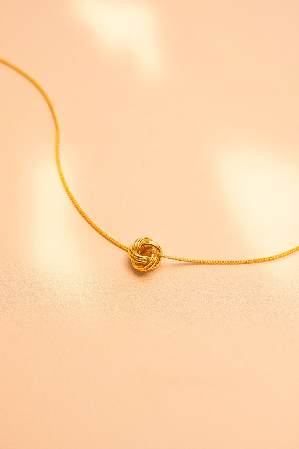Gold Knot Pendant Necklace