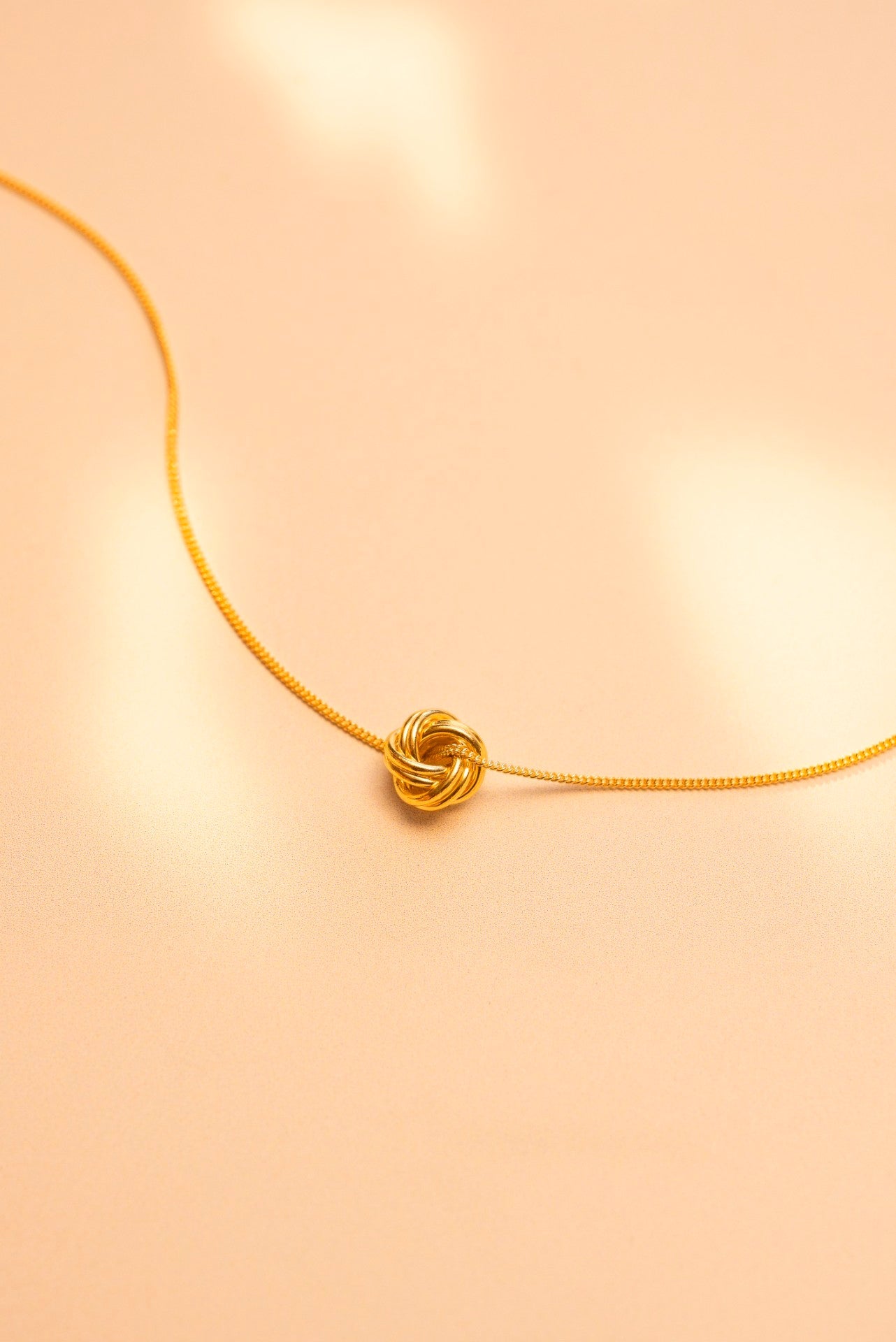 Gold Knot Pendant Necklace
