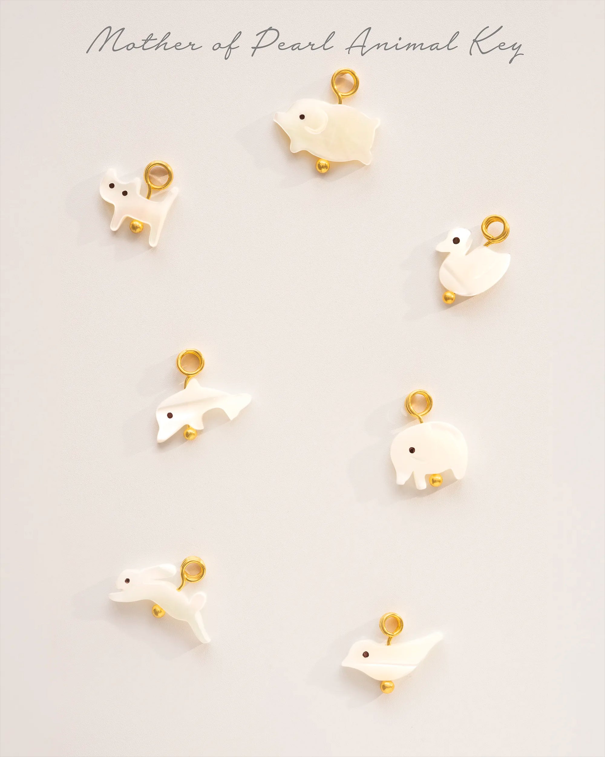 Gold animal charm