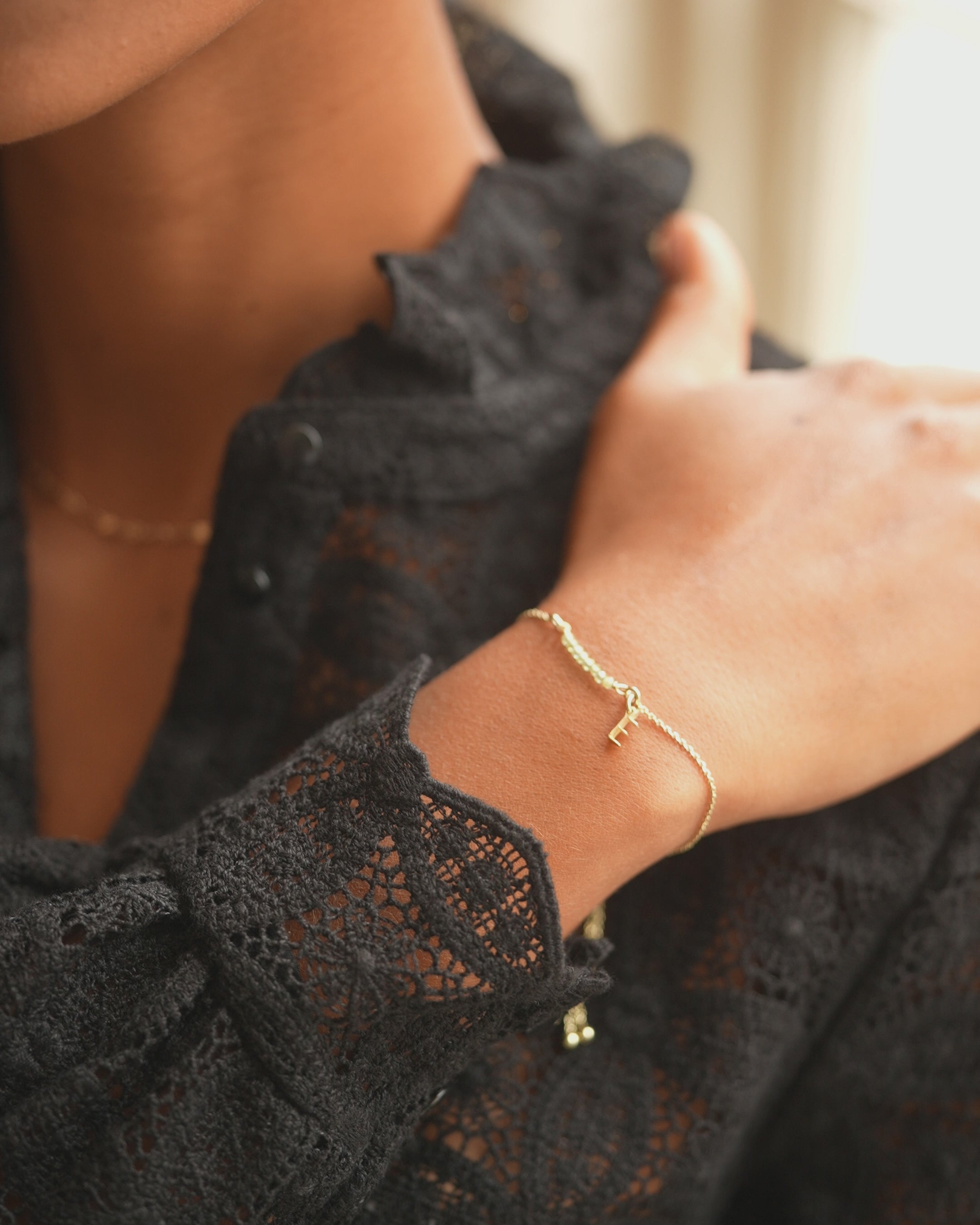 Gold pearl and initial bracelet