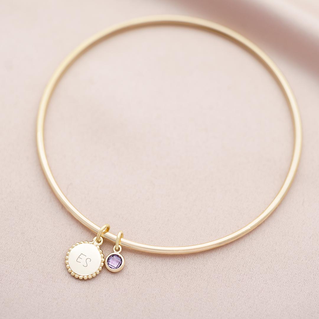 gold plated bangle with beaded edge disc charm and birthstone