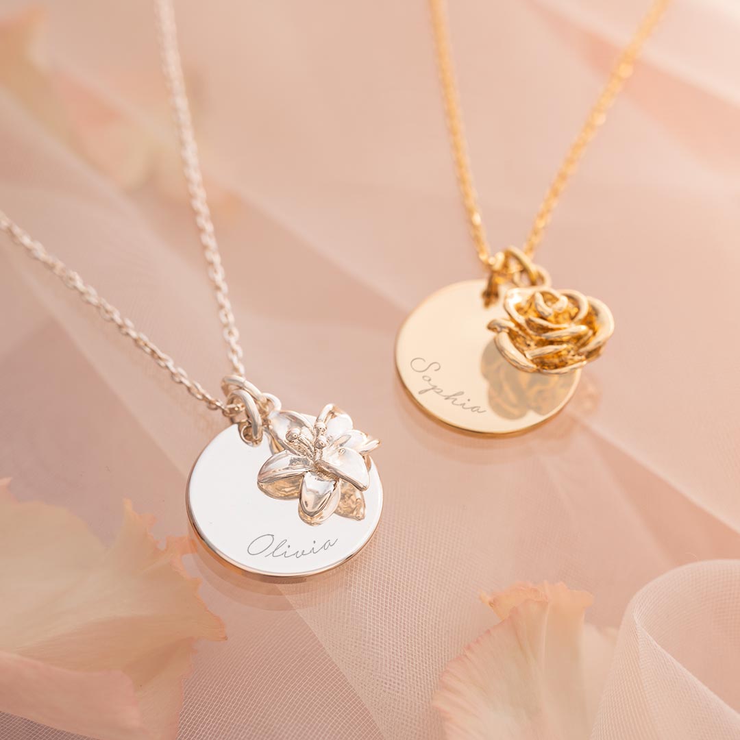 birth flower necklace engraved with a personalised name available in champagne gold and silver plated