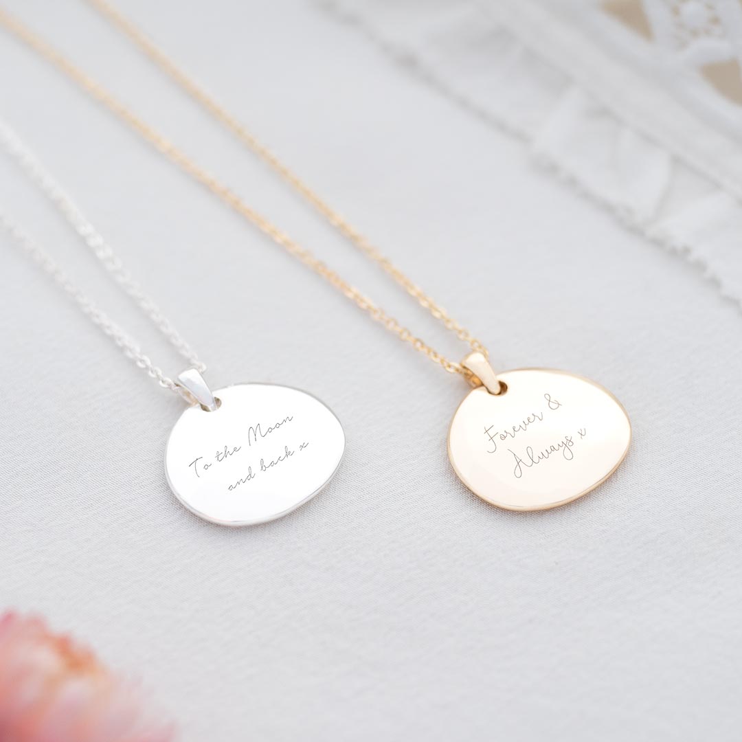 silver and gold plated organically shaped disc necklace with personalised message