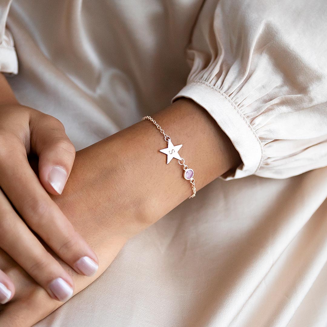 rose gold plated initial star birthstone bracelet personalised with an engraved classic style initial