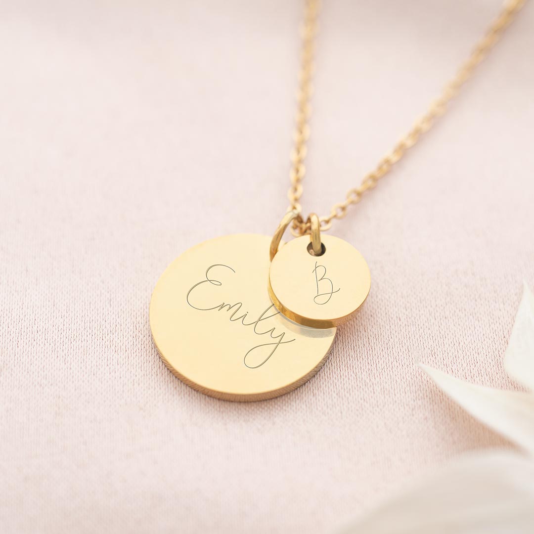 gold plated stainless steel necklace personalised with a handwritten script name and initial