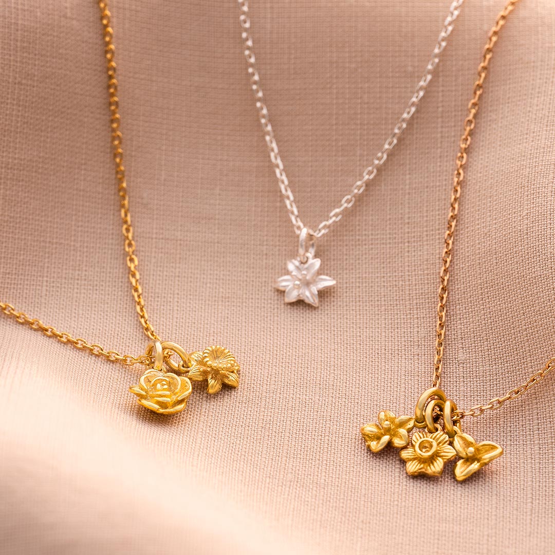 birth flower pendant necklace available in sterling silver and gold plated sterling silver